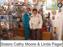 Sisters Cathy Moore And Linda Pagar in the Marston Family Wonder Woman Museum